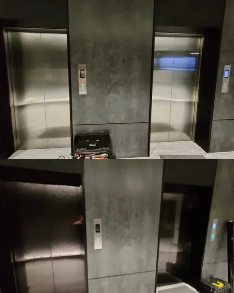 Puertas de elevador de oficina con película tono humo reflectiva